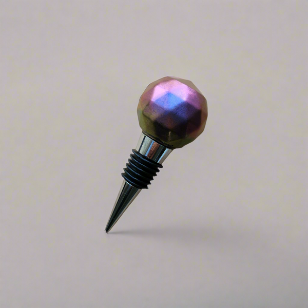 A color shifting resin wine stopper that changes from plum to gold.