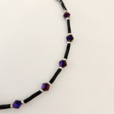 Handmade black and purple iridescent glass bead ankle bracelet by Blue Bourbon Designs.