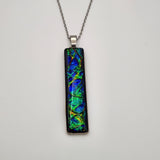 Black Sea dichroic pendant with iridescent Dichrolam resin on stainless steel chain