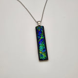 Black sea dichroic pendant with iridescent Dichrolam resin on stainless steel chain