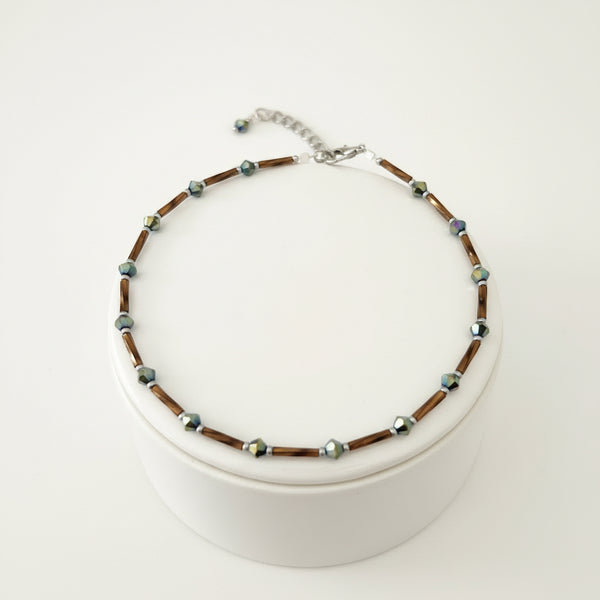 Handmade brown and iridescent green glass bead ankle bracelet by Blue Bourbon Designs