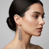 Laser-cut wooden candy cane earrings hand-painted and sealed with resin by Blue Bourbon Designs