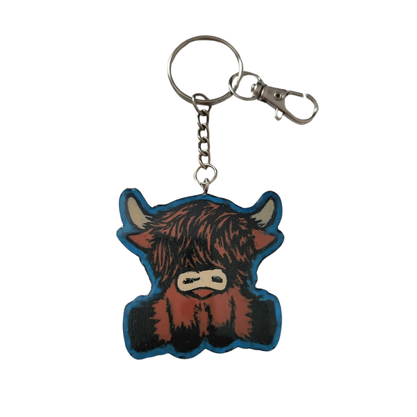 Hand-painted resin Highland cow keychain with clear resin topcoat