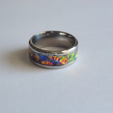 dichroic resin ring with orange, red, and yellow color-shifting effect