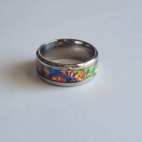 dichroic resin ring with orange, red, and yellow color-shifting effect