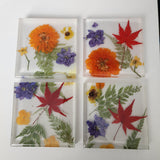 floral resin coasters set of four, handmade by Blue Bourbon Designs