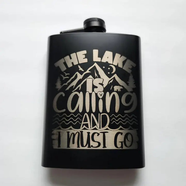 Laser-etched metal flask with lake is calling design