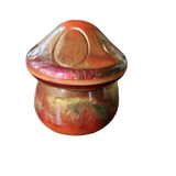 Handcrafted fall colored resin mushroom jar with mushroom-shaped lid by Blue Bourbon Designs