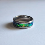 Hand-turned green dichroic resin ring shifting blue and green in the light