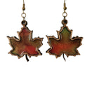 Maple leaf earrings made from laser cut wood and hand-poured resin with brass hooks