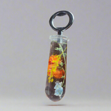 Clear resin bottle opener with orange floral flowers