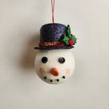 Handcrafted snowman ornament with snowy texture and glitter hat by Blue Bourbon Designs