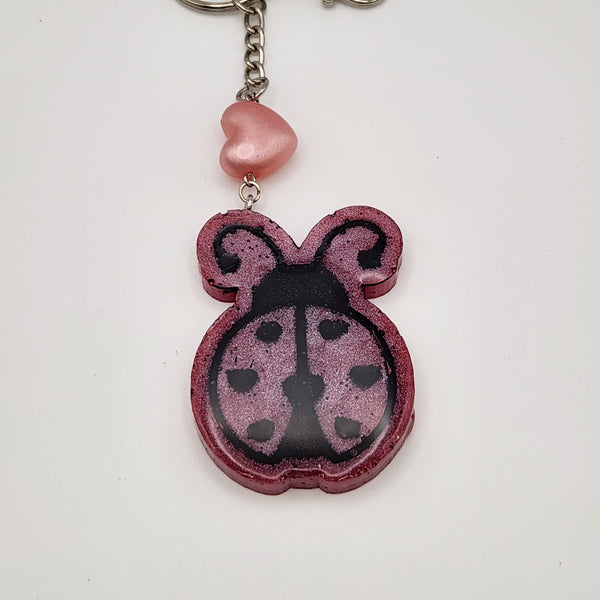 Hand-painted resin ladybug keychain with clear resin topcoat
