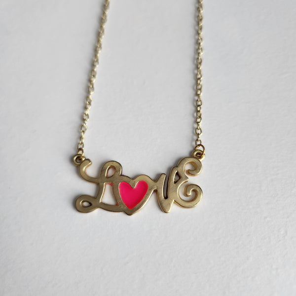 Gold LOVE necklace with pink glow-in-the-dark heart letter on faux gold chain