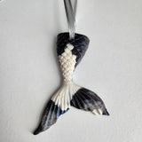 Hand-poured resin mermaid tail ornament in multiple colors.