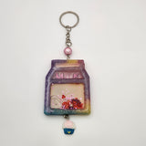 Milk carton shaker keychain filled with oil and floating charms