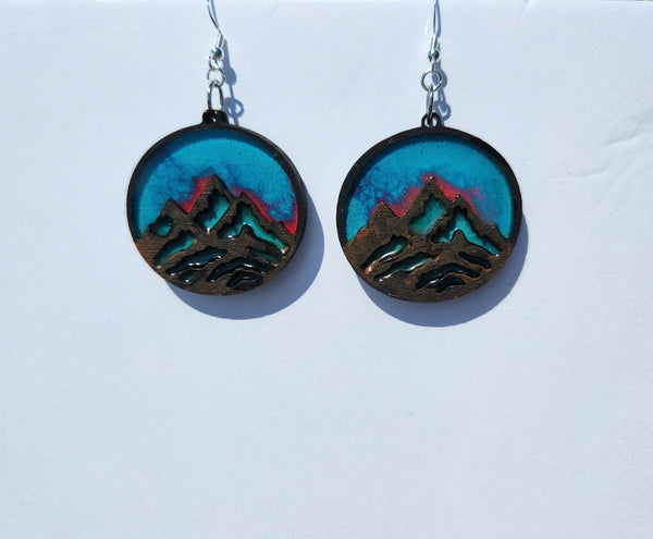 One-of-a-kind mountain earrings made from laser cut wood and resin with stainless steel hooks