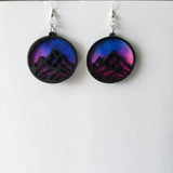 One-of-a-kind mountain earrings made from laser cut wood and resin with stainless steel hooks