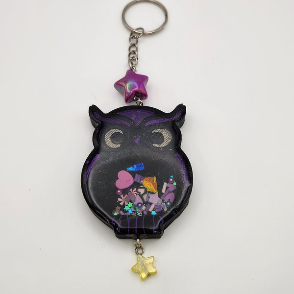Owl shaker keychain filled with oil and floating charms