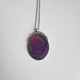 Oval frame pendant necklace with hand-poured resin on stainless steel chain