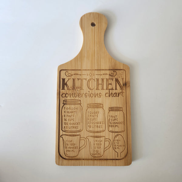 Laser engraved wooden Kitchen Conversion mini charcuterie board by Blue Bourbon Designs.