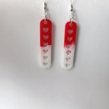 Resin dangle heart earrings on stainless steel hooks in multiple colors