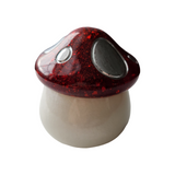 Handcrafted red glitter and white resin mushroom jar with mushroom-shaped lid by Blue Bourbon Designs