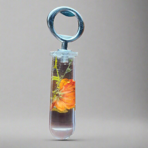 Clear resin bottle opener with orange floral flowers