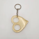 Hand-poured resin self defense keychain in unique colors and shapes