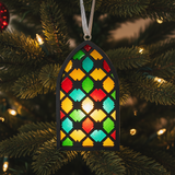 Hand-painted black wood stained glass window ornament filled with colorful resin by Blue Bourbon Designs.”