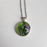 1-inch round resin necklace on silver stainless steel chain