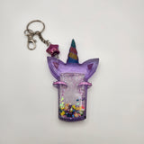 Unicorn shaker keychain filled with oil and moving charms