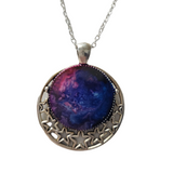 Round metal crescent moon and star pendant with resin center on stainless steel chain