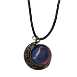 Double-sided resin moon necklace with brass crescent and black cord chain