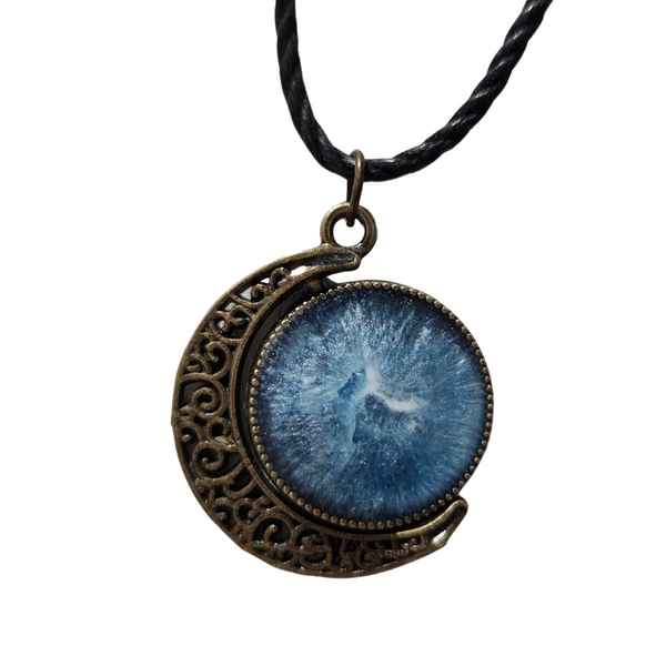 Double-sided resin moon necklace with brass crescent and black cord chain