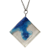 Multi-depth resin island pendant with layered land and water design