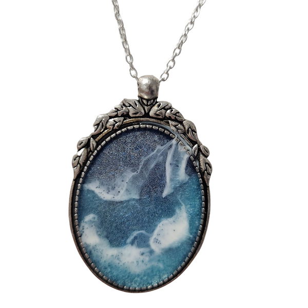 Oval frame pendant necklace with hand-poured resin on stainless steel chain