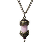 A bronze-colored pendant tube necklace with a matching chain.