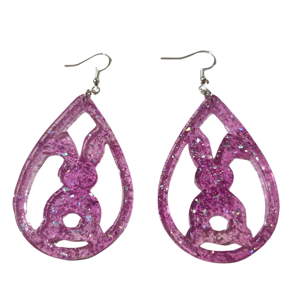 Translucent resin teardrop rabbit dangle earrings with colorful glitter on stainless steel hooks.