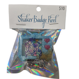 Tv shaker badge reel