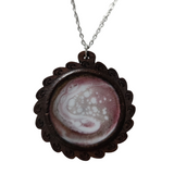 1.5 inch round wood pendant with resin-filled center on a stainless steel chain.