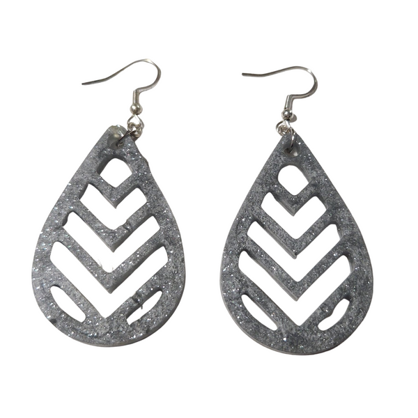 A pair of silver chevron-patterned teardrop earrings on stainless steel hooks.