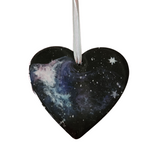 Handmade space heart ornament with black resin base and galaxy swirls by Blue Bourbon Designs.