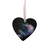 Handmade space heart ornament with black resin base and galaxy swirls by Blue Bourbon Designs.