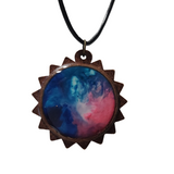 1.5 inch round wood pendant with resin-filled center on leather cord